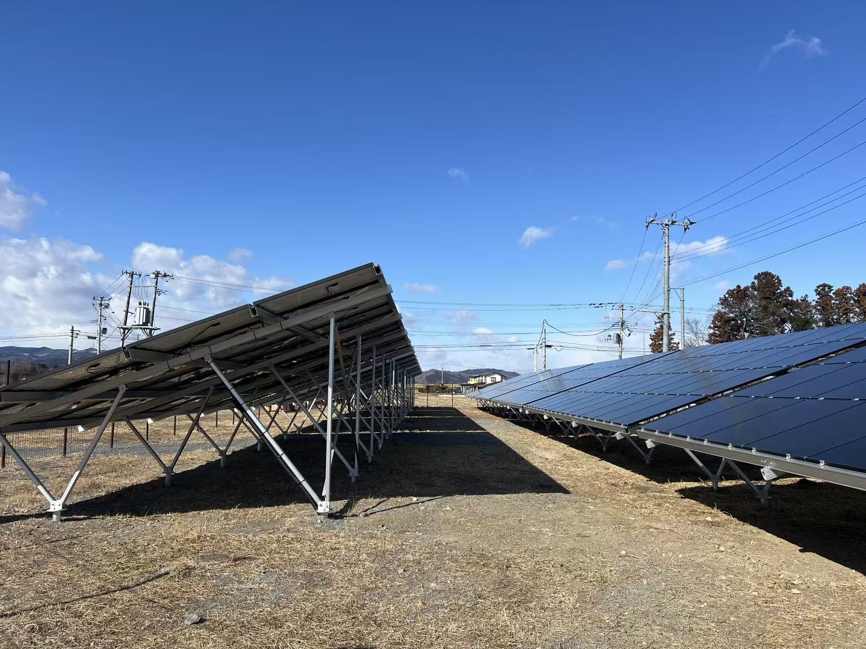 Materiale av solcellejordbrakett